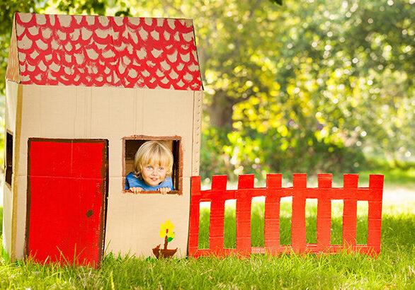 Cute little boy playing in a playhouse. Horizontal Shot. Please checkout our lightboxes